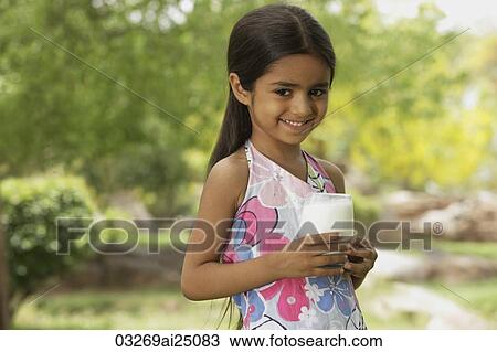 little girl with glass of milk View Large Photo Image Stock Image - little girl with glass of milk. Fotosearch