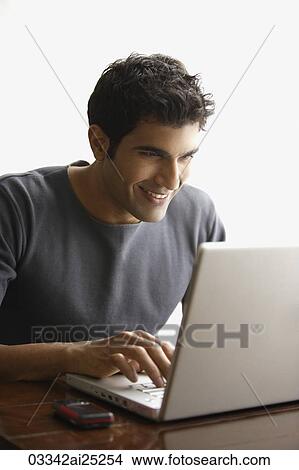 man at laptop View Large Photo Image Picture - man at laptop. Fotosearch
