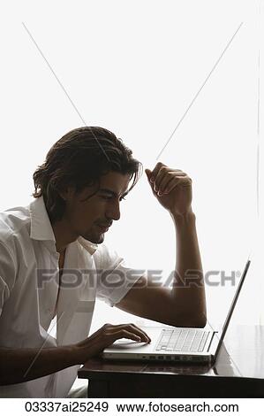 man at laptop View Large Photo Image Stock Photo - man at laptop. Fotosearch