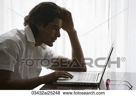 man at laptop View Large Photo Image Stock Photo - man at laptop. Fotosearch