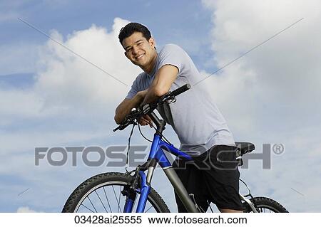 Stock Photography - Man on bicycle. Fotosearch