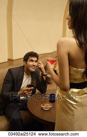 Man smiling up at woman View Large Photo Image Picture - Man smiling up at woman. Fotosearch