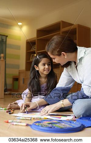 mother and daughter coloring View Large Photo Image Stock Photo - mother and daughter coloring. Fotosearch
