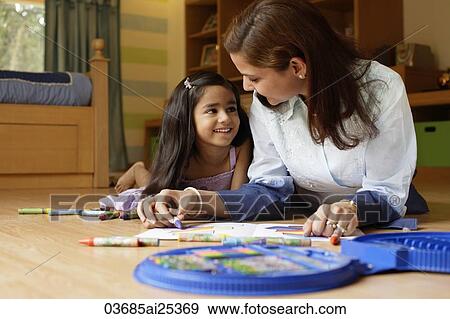Stock Photo - mother and daughter coloring. Fotosearch