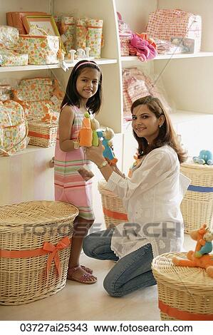 mother and daughter in toy store View Large Photo Image Stock Image - mother and daughter in toy store. Fotosearch