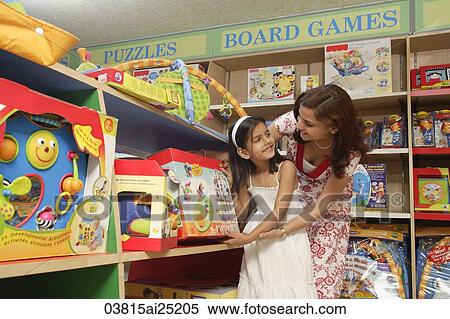 mother and daughter shopping for toys View Large Photo Image Stock Photography - mother and daughter shopping for toys. Fotosearch