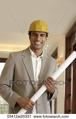 portrait of contractor with blueprints View Large Photo Image Stock Image - portrait of contractor with blueprints. Fotosearch