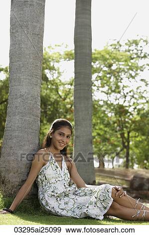 Teen girl in the park View Large Photo Image Stock Photo - Teen girl in the park. Fotosearch