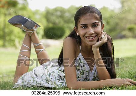 Stock Photography - Teen girl in the park. Fotosearch
