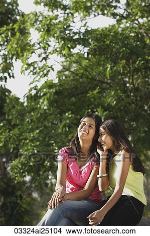 Teen girls giggling View Large Photo Image Picture - Teen girls giggling. Fotosearch