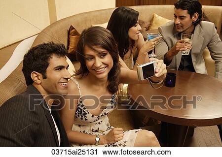 two couples in restaurant View Large Photo Image Stock Image - two couples in restaurant. Fotosearch