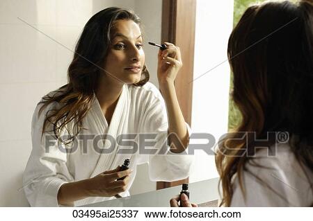 woman applying mascara View Large Photo Image Stock Photo - woman applying mascara. Fotosearch