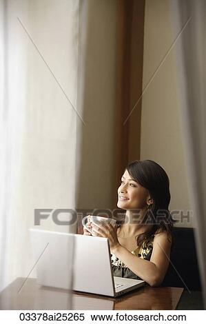 woman with laptop, cup of coffee View Large Photo Image Stock Photography - woman with laptop, cup of coffee. Fotosearch