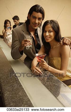 young adults at a bar View Large Photo Image Stock Image - young adults at a bar. Fotosearch