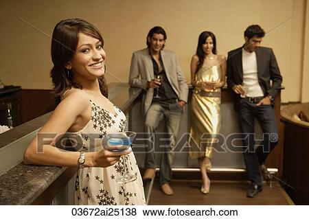 Stock Photo - young adults at a bar. Fotosearch