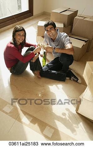 young couple in new home View Large Photo Image Stock Image - young couple in new home. Fotosearch