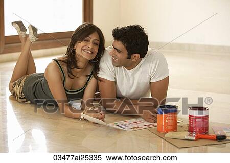 young couple preparing to paint View Large Photo Image Stock Photography - young couple preparing to paint. Fotosearch