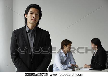 Business colleagues, businessman in foreground View Large Photo Image Stock Photography - Business colleagues, businessman in foreground. Fotosearch