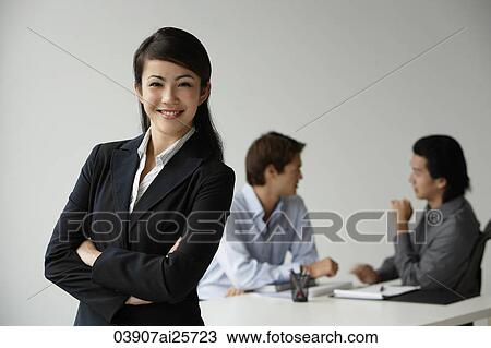 Business colleagues, businesswoman in foreground View Large Photo Image Stock Image - Business colleagues, businesswoman in foreground. Fotosearch