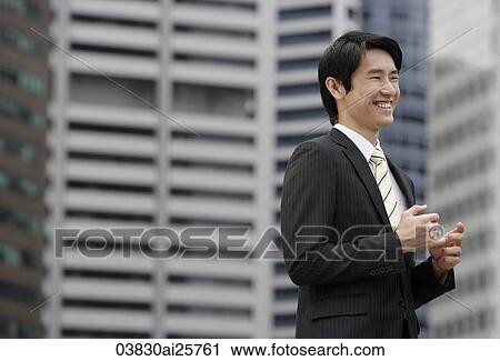 Stock Image - Businessman laughing. Fotosearch