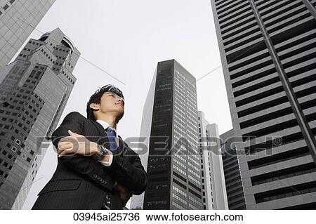 Businessman with arms crossed View Large Photo Image Stock Photograph - Businessman with arms crossed. Fotosearch