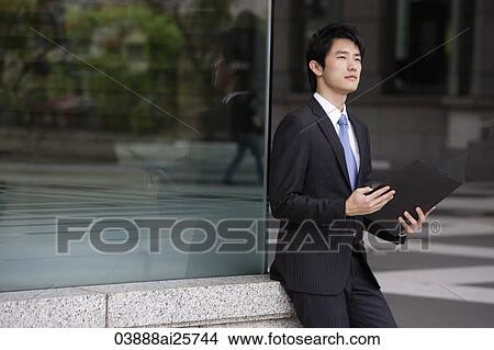 Picture - Businessman with portfolio. Fotosearch