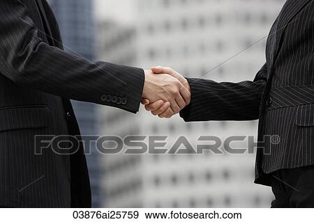 Colleagues shaking hands View Large Photo Image Stock Photo - Colleagues shaking hands. Fotosearch
