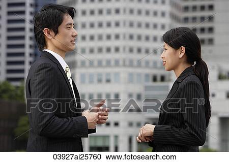 Profile of business colleagues in conversation View Large Photo Image Stock Image - Profile of business colleagues in conversation. Fotosearch