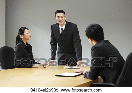 Business associates in conference room View Large Photo Image Stock Photography - Business associates in conference room. Fotosearch