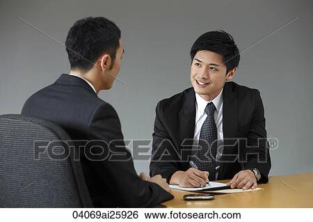 colleagues in a meeting View Large Photo Image Stock Photograph - colleagues in a meeting. Fotosearch