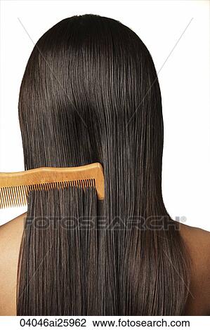 Stock Image - comb through long dark hair. Fotosearch