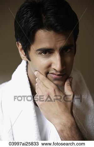 Man touching his face View Large Photo Image Stock Image - Man touching his face. Fotosearch