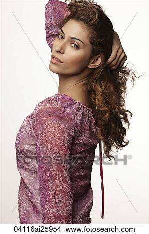 woman holding hair back View Large Photo Image Picture - woman holding hair back. Fotosearch