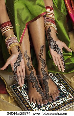 woman's hands and feet painted with henna View Large Photo Image Picture - woman's hands and feet painted with henna. Fotosearch