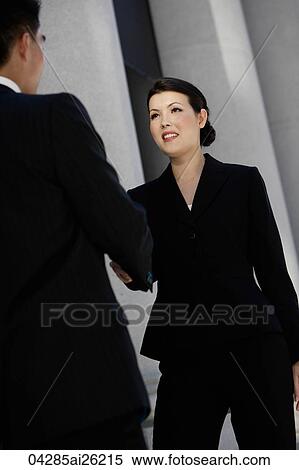 Business executives meeting, shaking hands View Large Photo Image Stock Photography - Business executives meeting, shaking hands. Fotosearch