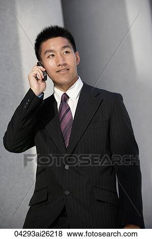 Businessman on mobile phone View Large Photo Image Stock Photo - Businessman on mobile phone. Fotosearch