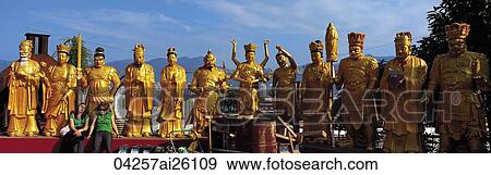 Gold Arhans line up at Ten Thousand Buddhas Temple, Shatin, Hong Kong View Large Photo Image Stock Photo - Gold Arhans line up at Ten Thousand Buddhas Temple, Shatin, Hong Kong. Fotosearch