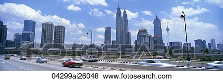 Stock Photo - Kuala Lumpur skyline from the highway, Malaysia. Fotosearch