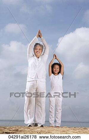 Older woman and young girl exercising. View Large Photo Image Stock Photo - Older woman and young girl exercising.. Fotosearch