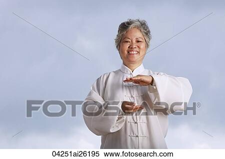 Older woman doing martial arts. View Large Photo Image Stock Photography - Older woman doing martial arts.. Fotosearch
