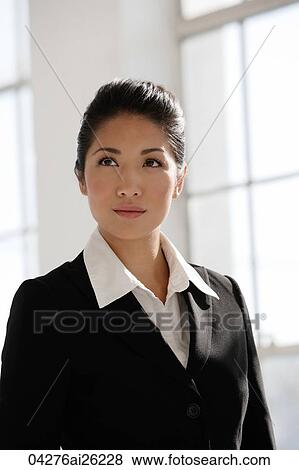 Portrait of businesswoman looking away View Large Photo Image Stock Photo - Portrait of businesswoman looking away. Fotosearch