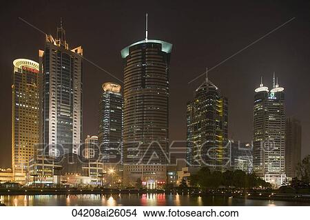 Skyscrapers in Liujiazui at night, Pudong, Shanghai, China View Large Photo Image Picture - Skyscrapers in Liujiazui at night, Pudong, Shanghai, China. Fotosearch