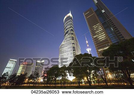 Stock Image - Skyscrapers in Liujiazui at night, Pudong, Shanghai, China. Fotosearch