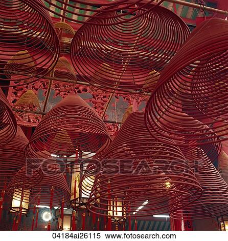 Spiral incense in Man Mo Temple, Central, Hong Kong View Large Photo Image Stock Photography - Spiral incense in Man Mo Temple, Central, Hong Kong. Fotosearch