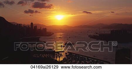 Sunset over Victoria Harbour, Hong Kong View Large Photo Image Stock Photo - Sunset over Victoria Harbour, Hong Kong. Fotosearch
