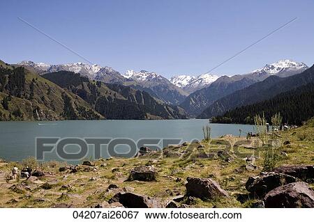 Tianshan Lake (Lake of Heaven), Wulumuqi, Xinjiang, China View Large Photo Image Stock Photo - Tianshan Lake (Lake of Heaven), Wulumuqi, Xinjiang, China. Fotosearch