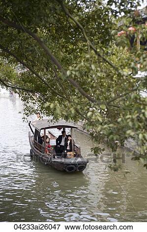 Tourists on excursion boats, Zhujiajiao, China View Large Photo Image Stock Photo - Tourists on excursion boats, Zhujiajiao, China. Fotosearch