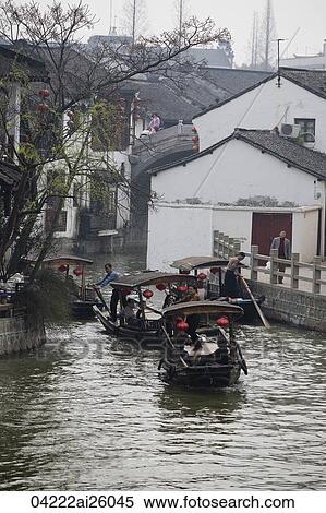 Tourists on excursion boats, Zhujiajiao, China View Large Photo Image Stock Photography - Tourists on excursion boats, Zhujiajiao, China. Fotosearch