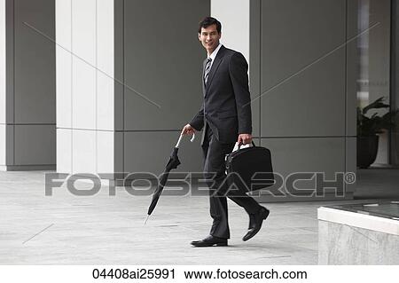 man carrying briefcase
