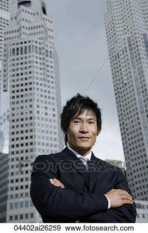 Stock Photo - Businessman with folded arms. Fotosearch